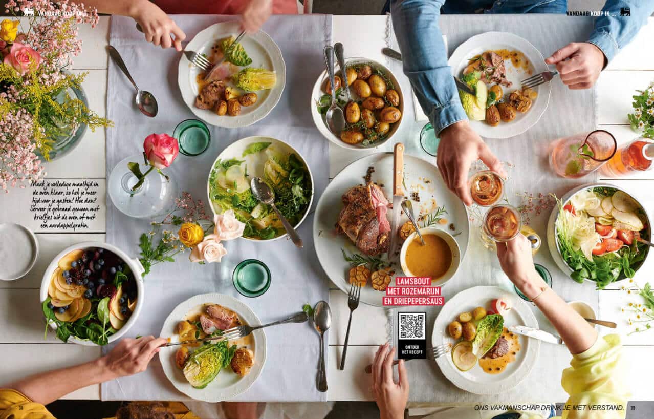 How Content Is Shaping the Way Consumers Shop for Groceries 4 a spread from Delhaize's online catalog showing a dining table full of delicious recipes.