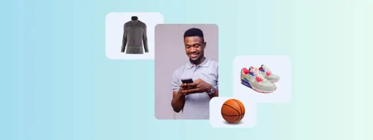A man on his phone surrounded by a basketball, sneakers and a running top