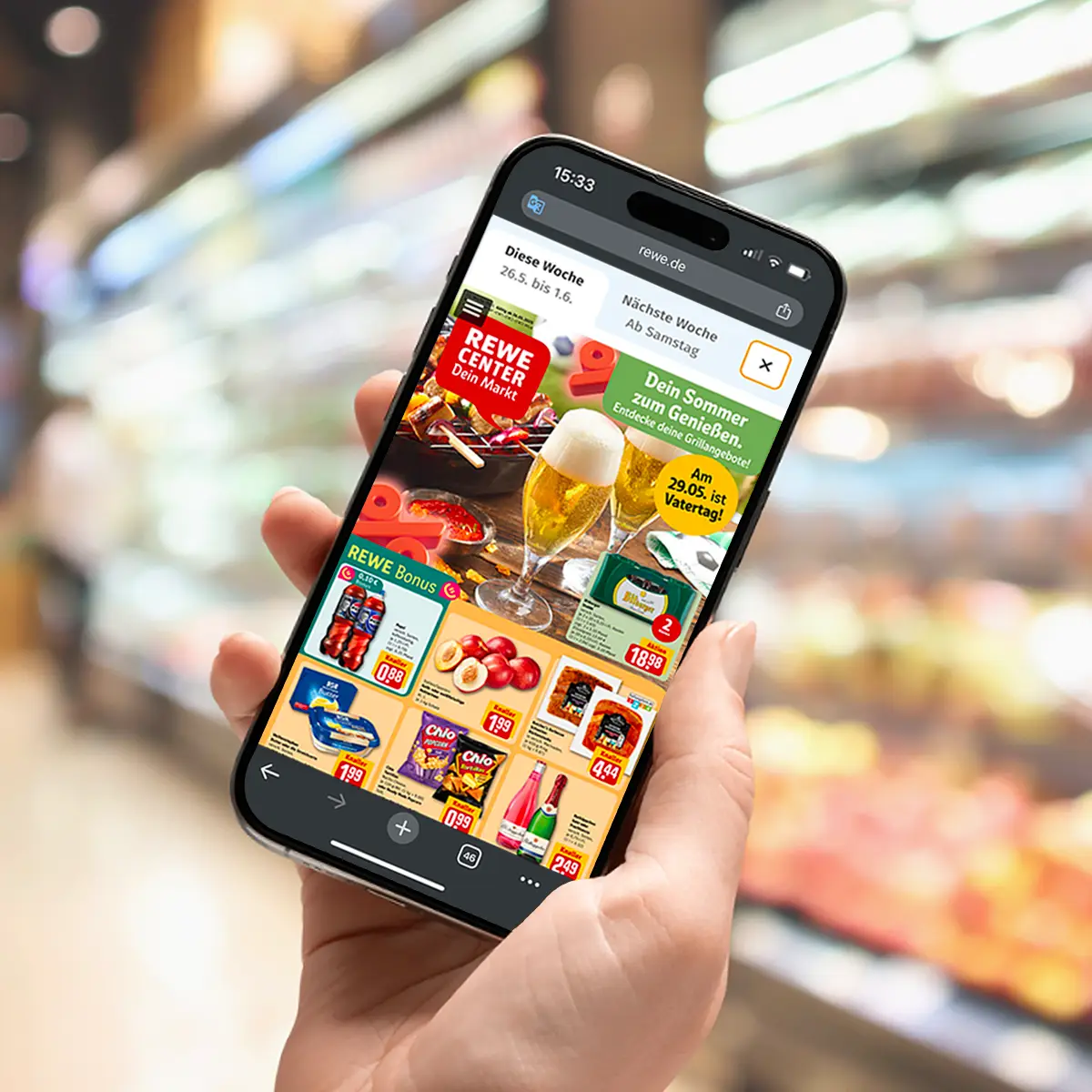 REWE Partners with Publitas to Transform Digital Offer Communication 2 Hand holding phone with grocery leaflet on screen