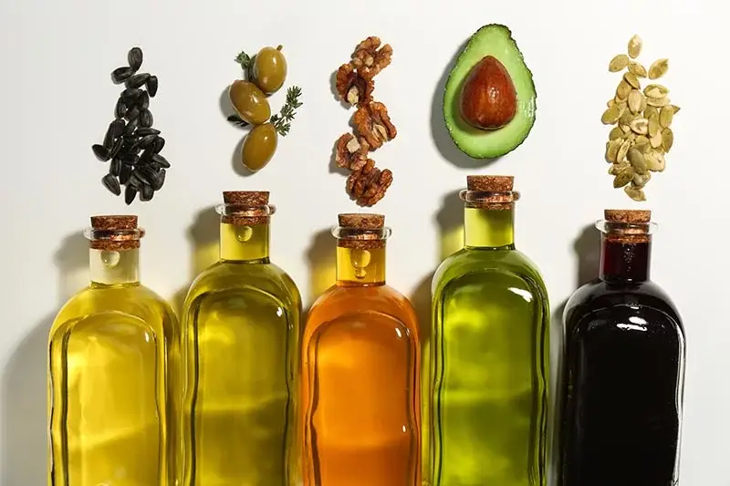 What Sparked 400% Growth in This Retail Product? 1 A row of olive oil bottles with different types of seeds above them